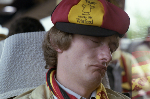Watford fan resting after a disappointing result Watford fan resting after a disappointing result